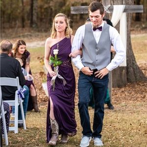 Size 2 bridesmaid dress. Deep purple. Only altered for length. I’m 5’2.